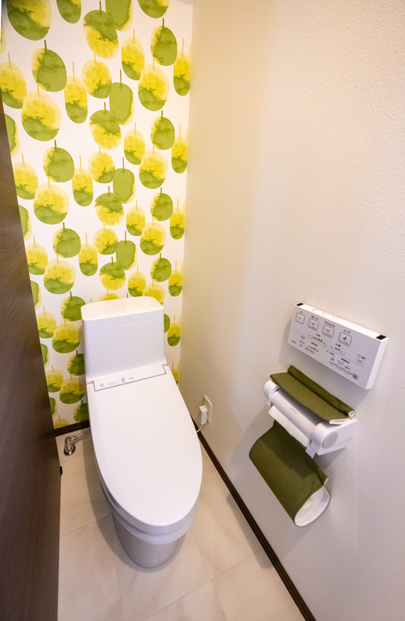 藤枝市の2階建て注文住宅|フレッシュなグリーンがかわいい、遊び心のあるナチュラルトイレ